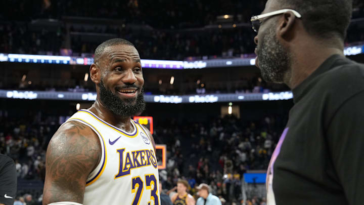 Jan 25, 2025; San Francisco, California, USA; Los Angeles Lakers forward LeBron James (23) talks with Golden State Warriors forward Draymond Green (right) after the game at Chase Center. Mandatory Credit: Darren Yamashita-Imagn Images