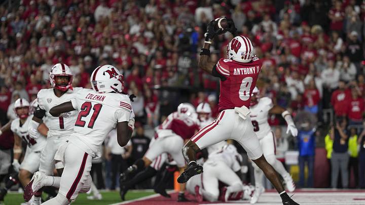 Aug 28, 2025; Madison, Wisconsin, USA; Wisconsin Badgers wide receiver Vinny Anthony II (8) catches a pass to score a touchdown during the third quarter against the Miami (OH) RedHawks at Camp Randall Stadium. Mandatory Credit: Jeff Hanisch-Imagn Images Aug 28, 2025; Madison, Wisconsin, USA; Wisconsin Badgers wide receiver Vinny Anthony II (8) catches a pass to score a touchdown during the third quarter against the Miami (OH) RedHawks at Camp Randall Stadium. Mandatory Credit: Jeff Hanisch-Imagn Images