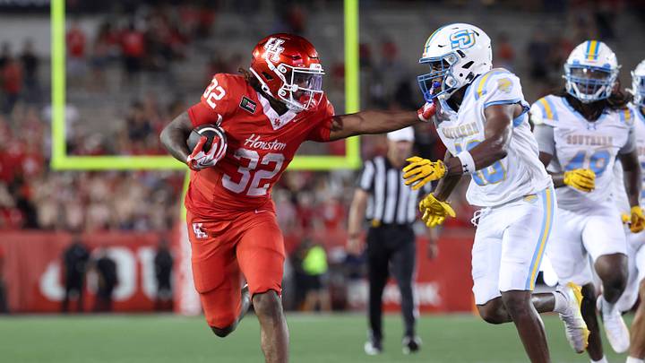 Houston Cougars RB Nehemiah Warmate runs with the ball during the fourth quarter against the Southern in a 77-6 win. Mandatory Credit: Troy Taormina-Imagn Images Houston Cougars RB Nehemiah Warmate runs with the ball during the fourth quarter against the Southern in a 77-6 win. Mandatory Credit: Troy Taormina-Imagn Images