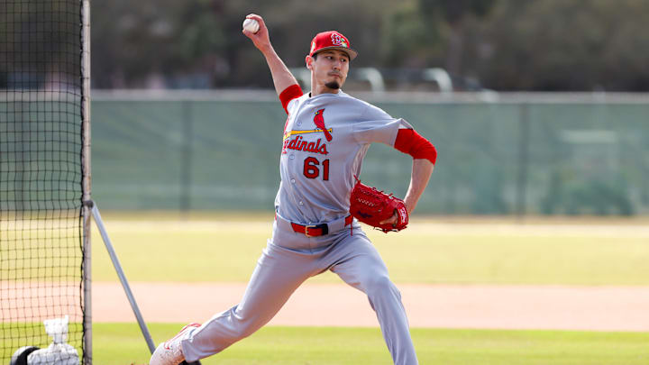 Feb 14, 2026; Jupiter, FL, USA; St. Louis Cardinals pitcher Riley O'Brien (61) delivers a pitch during a spring training workout at Roger Dean Chevrolet Stadium. Mandatory Credit: Sam Navarro-Imagn Images