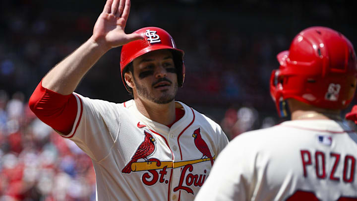 May 24, 2025; St. Louis, Missouri, USA;  St. Louis Cardinals third baseman Nolan Arenado (28) celebrates with catcher Yohel Pozo (63) after scoring against the Arizona Diamondbacks during the seventh inning at Busch Stadium. Mandatory Credit: Jeff Curry-Imagn Images