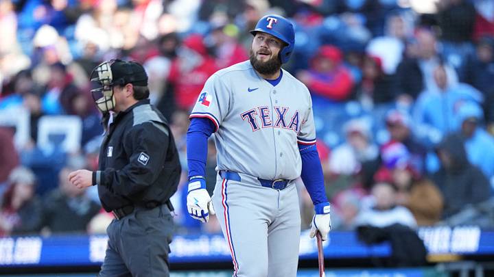 Mar 28, 2026; Philadelphia, Pennsylvania, USA; Texas Rangers infielder Jake Burger (21) reacts after striking out against the Philadelphia Phillies in the fifth inning at Citizens Bank Park. Mandatory Credit: Kyle Ross-Imagn Images Mar 28, 2026; Philadelphia, Pennsylvania, USA; Texas Rangers infielder Jake Burger (21) reacts after striking out against the Philadelphia Phillies in the fifth inning at Citizens Bank Park. Mandatory Credit: Kyle Ross-Imagn Images