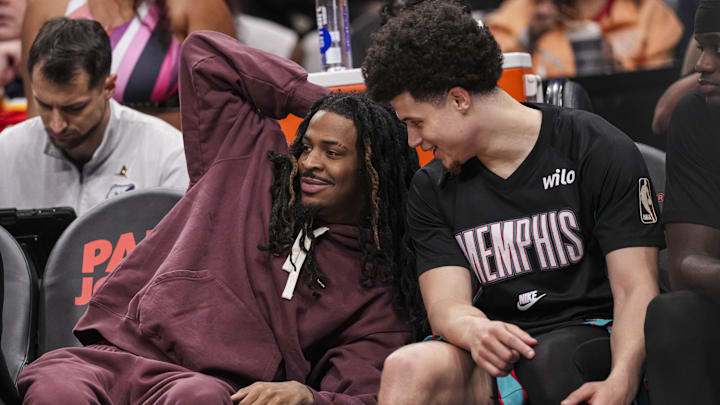 Mar 23, 2026; Atlanta, Georgia, USA; Memphis Grizzlies guard Ja Morant (12) on the bench with guard Walter Clayton Jr. (4) during the game against the Atlanta Hawks during the second half at State Farm Arena. Mandatory Credit: Dale Zanine-Imagn Images
