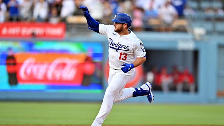Aug 5, 2025; Los Angeles, California, USA; Los Angeles Dodgers third baseman Max Muncy (13) runs the base after hitting a home run during the first inning against the St. Louis Cardinals at Dodger Stadium. Mandatory Credit: William Liang-Imagn Images