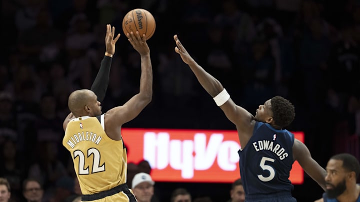 Nov 19, 2025; Minneapolis, Minnesota, USA; Washington Wizards forward Khris Middleton (22) shoots the ball over Minnesota Timberwolves guard Anthony Edwards (5) in the first half at Target Center. Mandatory Credit: Jesse Johnson-Imagn Images Nov 19, 2025; Minneapolis, Minnesota, USA; Washington Wizards forward Khris Middleton (22) shoots the ball over Minnesota Timberwolves guard Anthony Edwards (5) in the first half at Target Center. Mandatory Credit: Jesse Johnson-Imagn Images