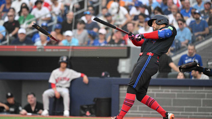 Jun 17, 2024; Toronto, Ontario, CAN;  Toronto Blue Jays right fielder George Springer (4) hits a broken bat single in the second inning against the Boston Red Sox at Rogers Centre. Mandatory Credit: Dan Hamilton-USA TODAY Sports