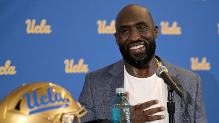Feb 13, 2024; Los Angeles, CA, USA;  DeShaun Foster answers questions from media after he was introduced as the new head football coach of UCLA Bruins during a press conference at Pauley Pavilion.  Mandatory Credit: Jayne Kamin-Oncea-Imagn Images