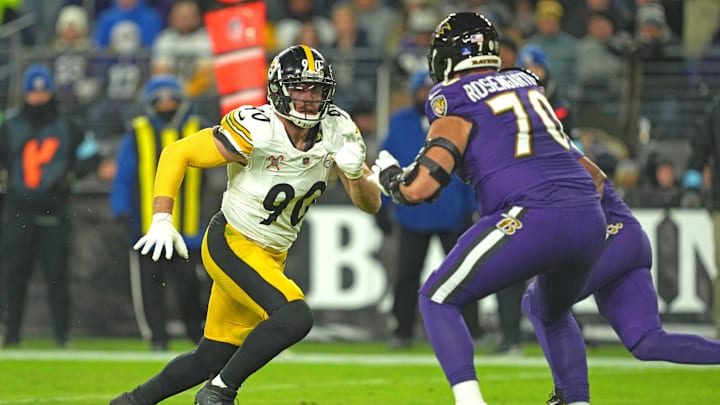 Dec 21, 2024; Baltimore, Maryland, USA; Pittsburgh Steelers linebacker T.J. Watt (90) rushes in the second quarter against Baltimore Ravens tackle Roger Rosengarten (70) at M&T Bank Stadium. Mandatory Credit: Mitch Stringer-Imagn Images