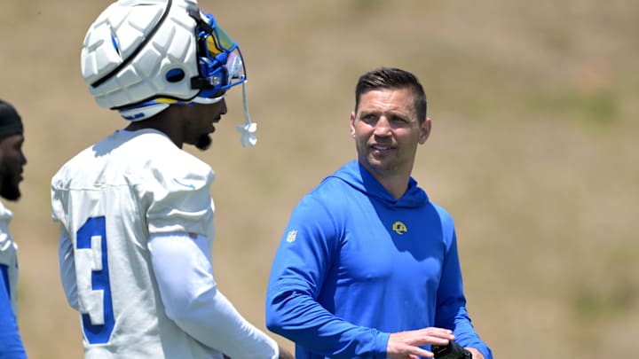 May 28, 2024; Thousand Oaks, CA, USA; Los Angeles Rams defensive coordinator Chris Shula talks with defensive back Kamren Curl (3) during OTAs at the team training facility at California Lutheran University. Mandatory Credit: Jayne Kamin-Oncea-Imagn Images