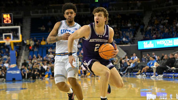 Jan 24, 2026; Los Angeles, California, USA; Northwestern Wildcats forward Nick Martinelli (2) drives past UCLA Bruins guard Eric Freeny (8) in the second half at Pauley Pavilion presented by Wescom Financial. Mandatory Credit: Jayne Kamin-Oncea-Imagn Images Jan 24, 2026; Los Angeles, California, USA; Northwestern Wildcats forward Nick Martinelli (2) drives past UCLA Bruins guard Eric Freeny (8) in the second half at Pauley Pavilion presented by Wescom Financial. Mandatory Credit: Jayne Kamin-Oncea-Imagn Images