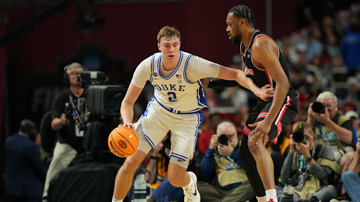 Apr 5, 2025; San Antonio, TX, USA; Duke Blue Devils forward Cooper Flagg (2) dribbles the ball against Houston Cougars forward J'Wan Roberts (13) during the first half in the semifinals of the men's Final Four of the 2025 NCAA Tournament at the Alamodome. Mandatory Credit: Bob Donnan-Imagn Images Apr 5, 2025; San Antonio, TX, USA; Duke Blue Devils forward Cooper Flagg (2) dribbles the ball against Houston Cougars forward J'Wan Roberts (13) during the first half in the semifinals of the men's Final Four of the 2025 NCAA Tournament at the Alamodome. Mandatory Credit: Bob Donnan-Imagn Images