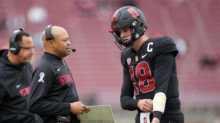Nov 5, 2022; Stanford, California, USA; Stanford Cardinal head coach David Shaw (left) talks to quarterback Tanner McKee (18) during the third quarter against the Washington State Cougars at Stanford Stadium. Mandatory Credit: Darren Yamashita-Imagn Images