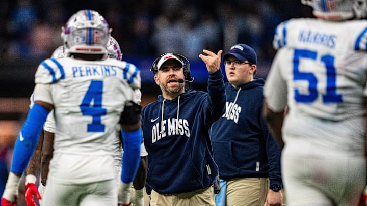 Ole Miss head coach Pete Golding talks with players during the Sugar Bowl and College Football Playoff quarterfinals at Caesars Superdome in New Orleans, La., on Thursday, Jan. 1, 2026. Ole Miss defeated Georgia 39-34.