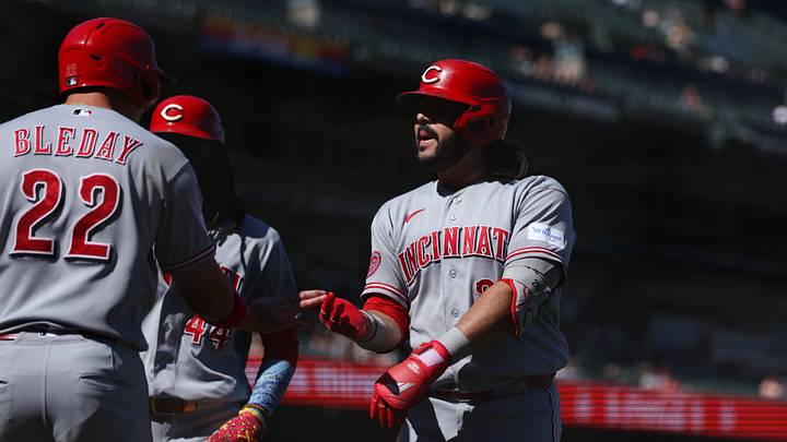Aug 26, 2026; San Francisco, California, USA;  Cincinnati Reds designated hitter Eugenio Suarez (28) is congratulated by teammates at home plate after hitting a grand slam during the ninth inning against the San Francisco Giants at Oracle Park.  Mandatory Credit: Sergio Estrada-Imagn Images