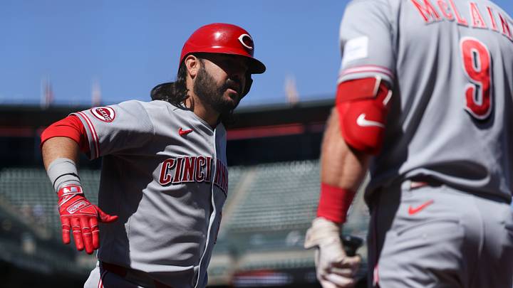 Aug 26, 2026; San Francisco, California, USA;  Cincinnati Reds designated hitter Eugenio Suarez (28) is congratulated by teammates at home plate after hitting a grand slam during the ninth inning against the San Francisco Giants at Oracle Park.  Mandatory Credit: Sergio Estrada-Imagn Images