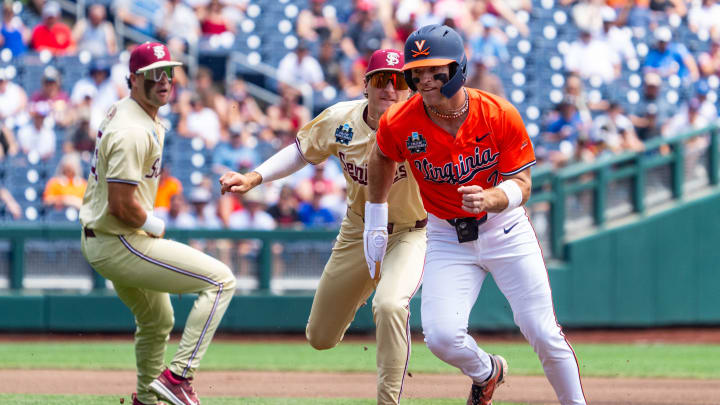 Henry Godbout is tagged out in a rundown during the Virginia baseball game vs. Florida State at the 2024 College World Series in Omaha. Henry Godbout is tagged out in a rundown during the Virginia baseball game vs. Florida State at the 2024 College World Series in Omaha.