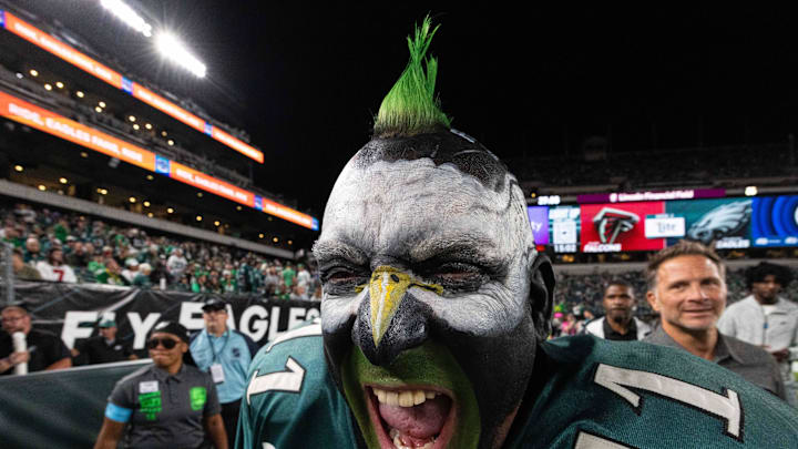 Sep 16, 2024; Philadelphia, Pennsylvania, USA; A Philadelphia Eagles fan cheers before the start of action against the Atlanta Falcons at Lincoln Financial Field. Mandatory Credit: Bill Streicher-Imagn Images
