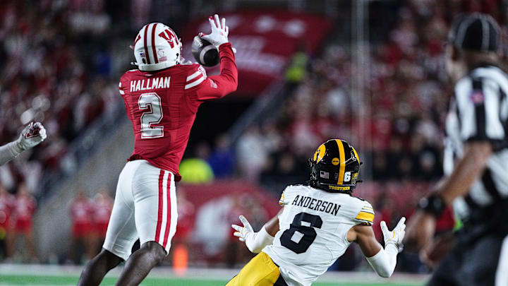Oct 11, 2025; Madison, Wisconsin, USA; Wisconsin Badgers cornerback Ricardo Hallman (2) breaks up a pass in the first half against the Iowa Hawkeyes at Camp Randall Stadium. Oct 11, 2025; Madison, Wisconsin, USA; Wisconsin Badgers cornerback Ricardo Hallman (2) breaks up a pass in the first half against the Iowa Hawkeyes at Camp Randall Stadium.