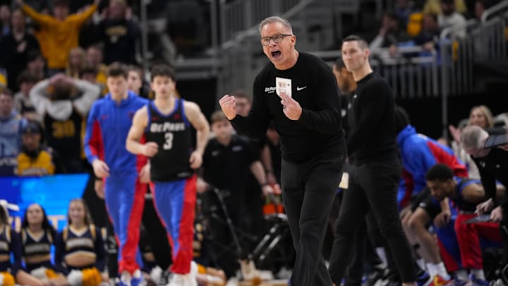 Mar 1, 2026; Milwaukee, Wisconsin, USA;  DePaul Blue Demons head coach Chris Holtmann reacts to a play during the first half against the Marquette Golden Eagles at Fiserv Forum.