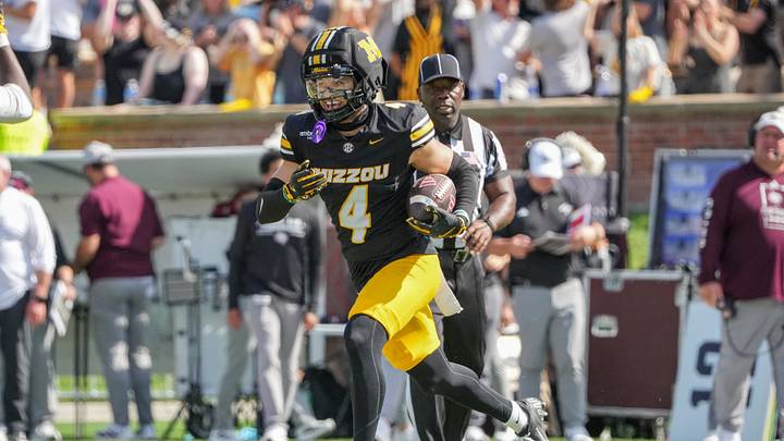 Oct 10, 2026; Columbia, Missouri, USA; Missouri Tigers safety Trajen Greco (4) celebrates after intercepting the Texas A&M Aggies during the first half of the game at Faurot Field at Memorial Stadium. Mandatory Credit: Denny Medley-Imagn Images