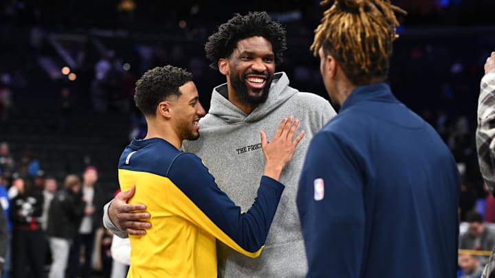 Mar 14, 2025; Philadelphia, Pennsylvania, USA; Indiana Pacers guard Tyrese Haliburton (0) reacts with Philadelphia 76ers center Joel Embiid (21) after the game at Wells Fargo Center. Mandatory Credit: Kyle Ross-Imagn Images