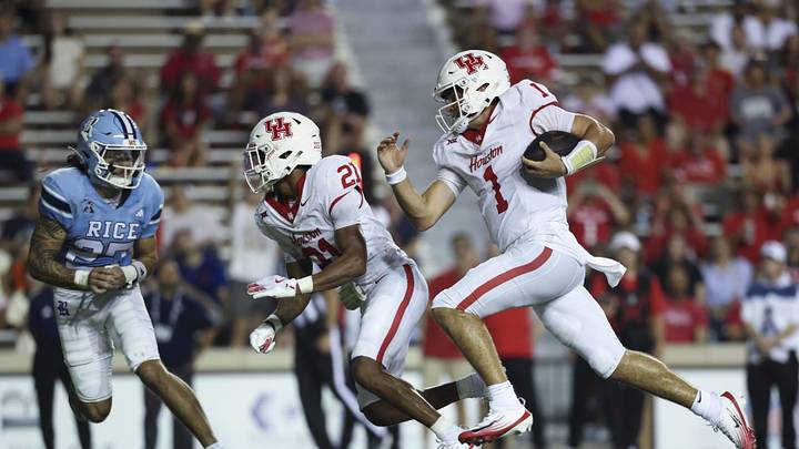 Sep 6, 2025; Houston, Texas, USA; Houston Cougars quarterback Conner Weigman (1) runs with the ball and scores a touchdown during the third quarter against the Rice Owls at Rice Stadium. Mandatory Credit: Troy Taormina-Imagn Images Sep 6, 2025; Houston, Texas, USA; Houston Cougars quarterback Conner Weigman (1) runs with the ball and scores a touchdown during the third quarter against the Rice Owls at Rice Stadium. Mandatory Credit: Troy Taormina-Imagn Images