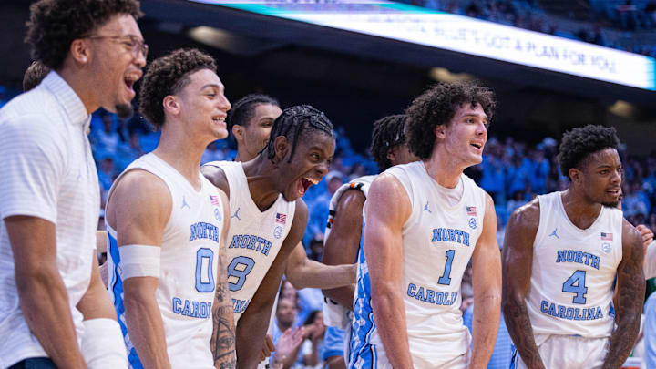 Nov 14, 2025; Chapel Hill, North Carolina, USA; North Carolina Tar Heels forward Caleb Wilson (8) and the Carolina bench celebrate in the second half against the North Carolina Central Eagles at Dean E. Smith Center. Mandatory Credit: Scott Kinser-Imagn Images Nov 14, 2025; Chapel Hill, North Carolina, USA; North Carolina Tar Heels forward Caleb Wilson (8) and the Carolina bench celebrate in the second half against the North Carolina Central Eagles at Dean E. Smith Center. Mandatory Credit: Scott Kinser-Imagn Images