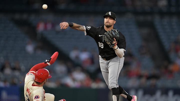 Sep 16, 2024; Anaheim, California, USA;  Los Angeles Angels left fielder Taylor Ward (3) is out as Chicago White Sox shortstop baseman Jacob Amaya (18) throws to first for a double play in the first inning at Angel Stadium.