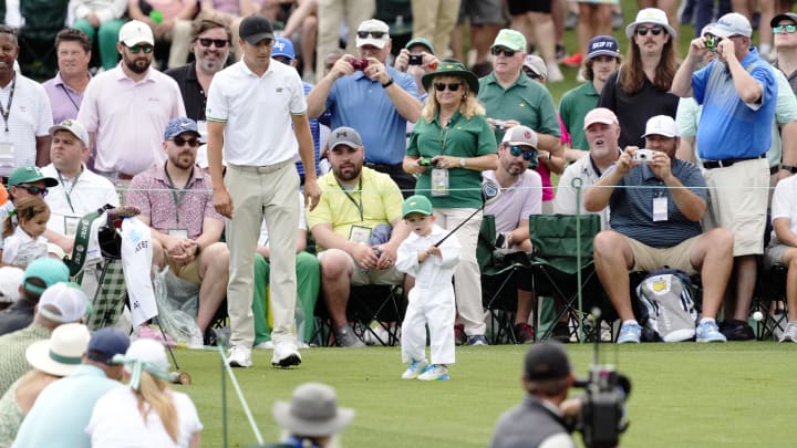 Apr 10, 2024; Augusta, Georgia, USA; Jordan Spieth watches as his son Sammy tees off on the second hole of the Masters Par 3 contest. 