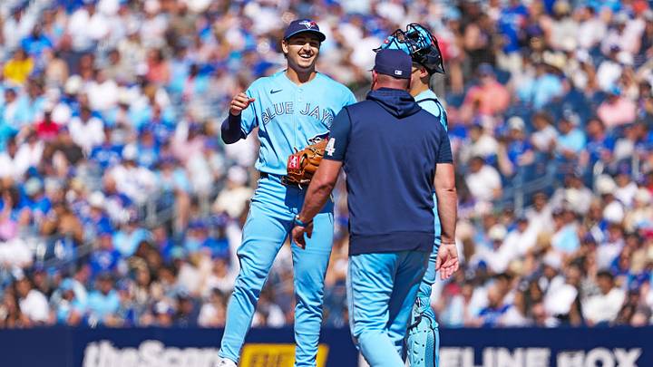 Aug 15, 2026; Toronto, Ontario, CAN; Toronto Blue Jays relief pitcher Ricky Tiedemann (33) is relieved by manager John Schneider (14) against the New York Yankees during the third inning at Rogers Centre. Mandatory Credit: Nick Turchiaro-Imagn Images Aug 15, 2026; Toronto, Ontario, CAN; Toronto Blue Jays relief pitcher Ricky Tiedemann (33) is relieved by manager John Schneider (14) against the New York Yankees during the third inning at Rogers Centre. Mandatory Credit: Nick Turchiaro-Imagn Images