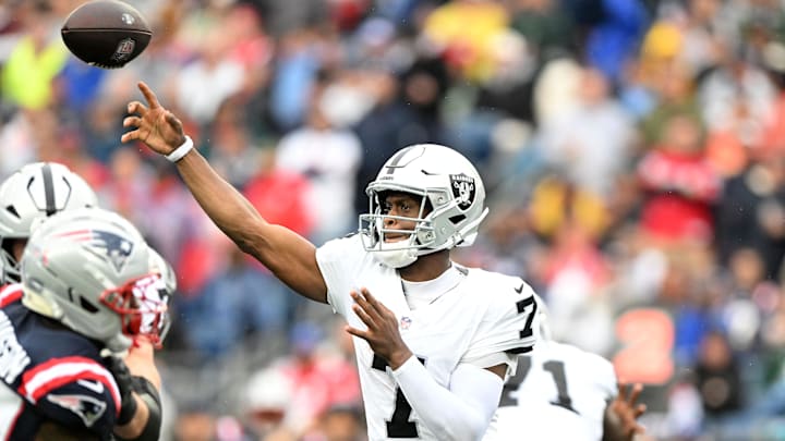 Sep 7, 2025; Foxborough, Massachusetts, USA; Las Vegas Raiders quarterback Geno Smith (7) drops back to pass against the New England Patriots in the first half at Gillette Stadium. Mandatory Credit: Brian Fluharty-Imagn Images