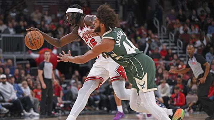 Oct 12, 2025; Chicago, Illinois, USA; Chicago Bulls forward Mouhamadou Gueye (16) and Milwaukee Bucks guard Andre Jackson Jr. (44) chase a loose ball during the second half at the United Center. Mandatory Credit: Matt Marton-Imagn Images Oct 12, 2025; Chicago, Illinois, USA; Chicago Bulls forward Mouhamadou Gueye (16) and Milwaukee Bucks guard Andre Jackson Jr. (44) chase a loose ball during the second half at the United Center. Mandatory Credit: Matt Marton-Imagn Images