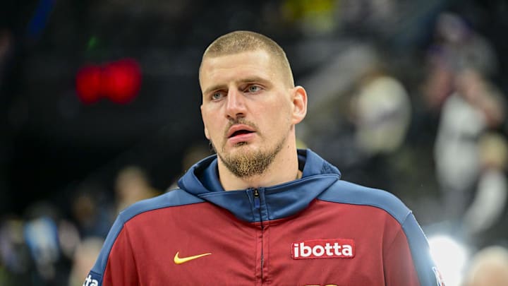 Denver Nuggets center Nikola Jokic (15) warming up against the Utah Jazz before the game at the Delta Center. 