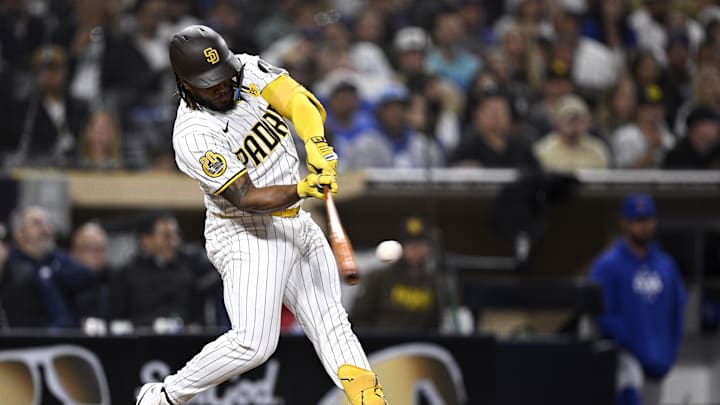 Apr 9, 2024; San Diego, California, USA; San Diego Padres third baseman Eguy Rosario (5) hits a home run against the Chicago Cubs during the sixth inning at Petco Park. Mandatory Credit: Orlando Ramirez-Imagn Images Apr 9, 2024; San Diego, California, USA; San Diego Padres third baseman Eguy Rosario (5) hits a home run against the Chicago Cubs during the sixth inning at Petco Park. Mandatory Credit: Orlando Ramirez-Imagn Images
