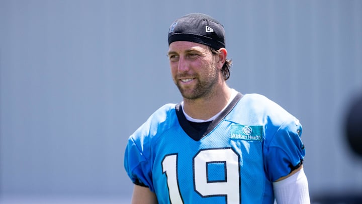 Carolina Panthers wide receiver Adam Thielen walks off after practice at training camp.