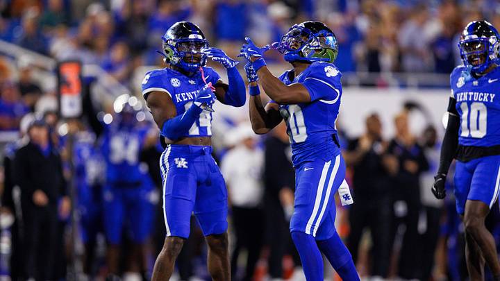 Oct 18, 2025; Lexington, Kentucky, USA; Kentucky Wildcats defensive back Terhyon Nichols (20) and defensive back Ty Bryant (14) react after a tackle during the second quarter against the Texas Longhorns at Kroger Field. Oct 18, 2025; Lexington, Kentucky, USA; Kentucky Wildcats defensive back Terhyon Nichols (20) and defensive back Ty Bryant (14) react after a tackle during the second quarter against the Texas Longhorns at Kroger Field.