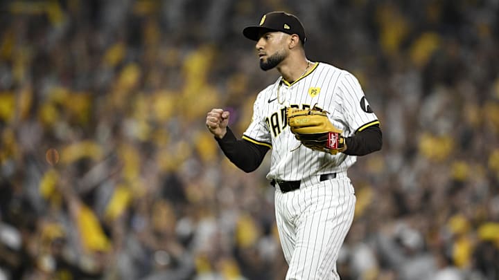 Oct 8, 2024; San Diego, California, USA; San Diego Padres pitcher Robert Suarez (75) celebrates after defeating the Los Angeles Dodgers during game three of the NLDS for the 2024 MLB Playoffs at Petco Park.