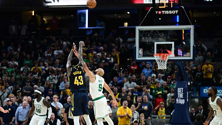 Oct 30, 2024; Indianapolis, Indiana, USA; Indiana Pacers forward Pascal Siakam (43) shoots a three pointer late in overtime to take the lead against the Boston Celtics at Gainbridge Fieldhouse. Mandatory Credit: Marc Lebryk-Imagn Images