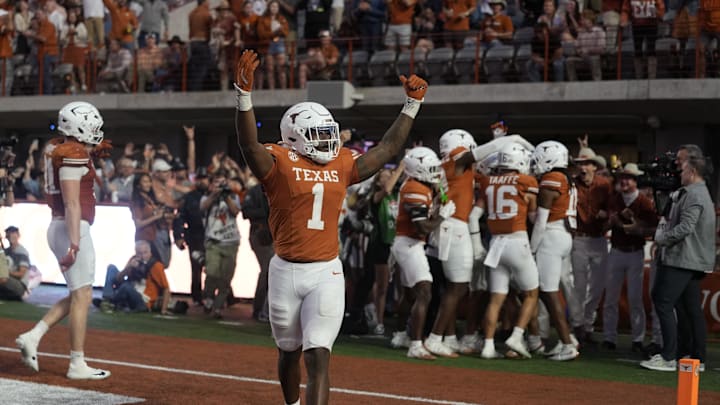 Texas Longhorns defensive lineman Colin Simmons (1) reacts after touchdown against the Arkansas Razorbacks, on Nov. 22, 2025 at Darrell K Royal-Texas Memorial Stadium in Austin, Texas.