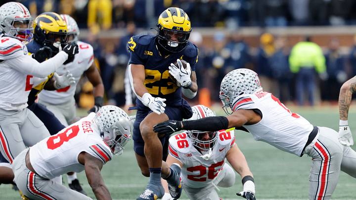 Nov 29, 2025; Ann Arbor, Michigan, USA; Michigan Wolverines running back Jordan Marshall (23) rushes in the first half against the Ohio State Buckeyes at Michigan Stadium. Mandatory Credit: Rick Osentoski-Imagn Images Nov 29, 2025; Ann Arbor, Michigan, USA; Michigan Wolverines running back Jordan Marshall (23) rushes in the first half against the Ohio State Buckeyes at Michigan Stadium. Mandatory Credit: Rick Osentoski-Imagn Images