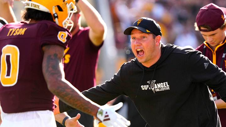 ASU head coach Kenny Dillingham celebrates with Arizona State wide receiver Jordyn Tyson (0) after a touchdown drive against BYU during the first half at Mountain America Stadium in Tempe on Nov. 23, 2024. ASU head coach Kenny Dillingham celebrates with Arizona State wide receiver Jordyn Tyson (0) after a touchdown drive against BYU during the first half at Mountain America Stadium in Tempe on Nov. 23, 2024.