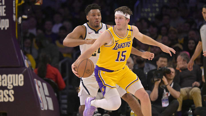 Mar 19, 2025; Los Angeles, California, USA: Denver Nuggets guard Jalen Pickett (24) defends Los Angeles Lakers guard Austin Reaves (15) in the second half at Crypto.com Arena. Mandatory Credit: Jayne Kamin-Oncea-Imagn Images Mar 19, 2025; Los Angeles, California, USA: Denver Nuggets guard Jalen Pickett (24) defends Los Angeles Lakers guard Austin Reaves (15) in the second half at Crypto.com Arena. Mandatory Credit: Jayne Kamin-Oncea-Imagn Images