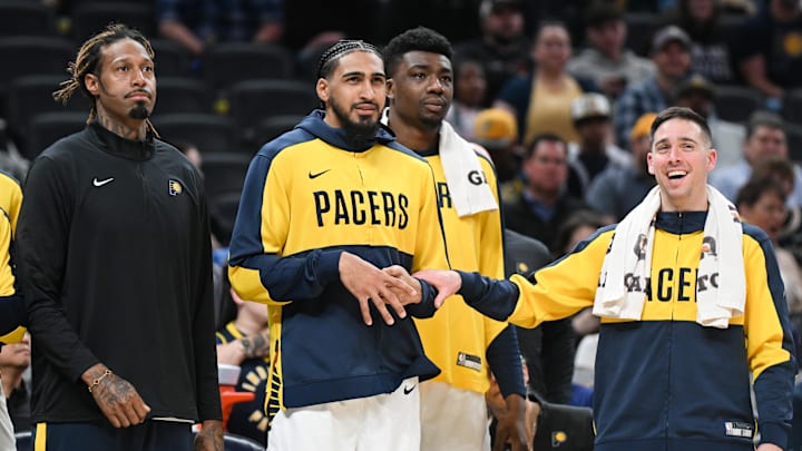 Mar 22, 2025; Indianapolis, Indiana, USA; Indiana Pacers forward James Johnson (16), forward Obi Toppin (1) and guard T.J. McConnell (9) watch from the bench during the second half against the Brooklyn Nets at Gainbridge Fieldhouse. Mandatory Credit: Robert Goddin-Imagn Images