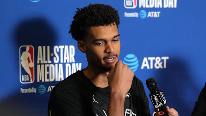 Feb 15, 2025; Oakland, CA, USA; Chuck’s Global Stars forward Victor Wembanyama (1) of the San Antonio Spurs is interviewed during the NBA All Star-Practice at Oakland Arena. Mandatory Credit: Darren Yamashita-Imagn Images