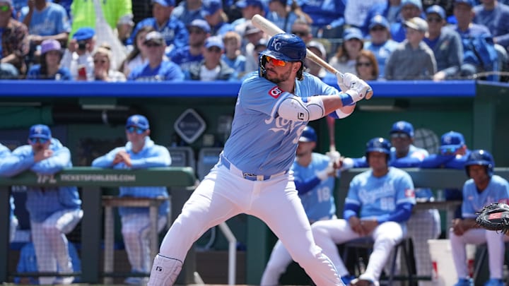 Apr 10, 2025; Kansas City, Missouri, USA; Kansas City Royals first base Vinnie Pasquantino (9) at bat against the Minnesota Twins during the game at Kauffman Stadium. Mandatory Credit: Denny Medley-Imagn Images