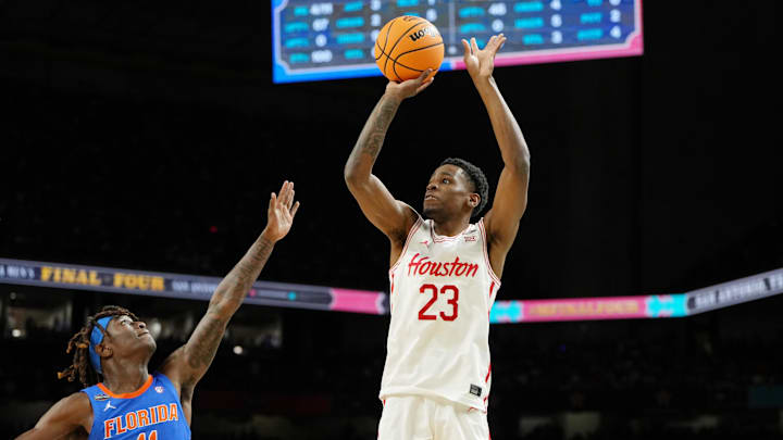 Apr 7, 2025; San Antonio, TX, USA; Houston Cougars guard Terrance Arceneaux (23) shoots the ball against Florida Gators guard Denzel Aberdeen (11) during the first half of the national championship game of the Final Four of the 2025 NCAA Tournament at the Alamodome.