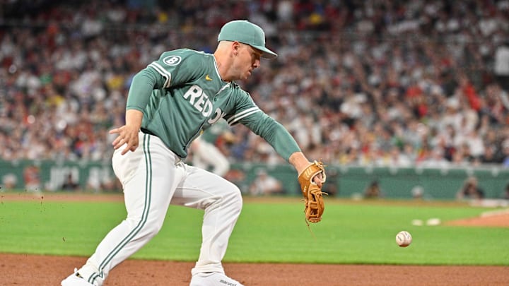 Boston Red Sox third baseman Alex Bregman (2) makes an error at third during the seventh inning against the Atlanta Braves at Fenway Park on May 16. 