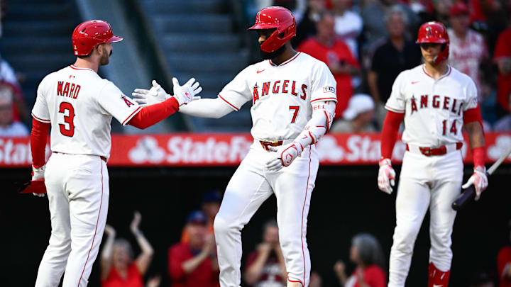 Aug 5, 2025; Anaheim, California, USA; Los Angeles Angels right fielder Jo Adell (7) celebrates his two-run home run with right fielder Taylor Ward (3) during the fifth inning against the Tampa Bay Rays at Angel Stadium of Anaheim. Mandatory Credit: Kelvin Kuo-Imagn Images Aug 5, 2025; Anaheim, California, USA; Los Angeles Angels right fielder Jo Adell (7) celebrates his two-run home run with right fielder Taylor Ward (3) during the fifth inning against the Tampa Bay Rays at Angel Stadium of Anaheim. Mandatory Credit: Kelvin Kuo-Imagn Images