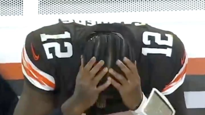 Shedeur Sanders on the bench during Sunday's loss. 