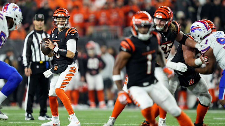 Cincinnati Bengals quarterback Joe Burrow (9) eyes Cincinnati Bengals wide receiver Ja'Marr Chase (1) while he runs a route in the fourth quarter during a Week 9 NFL football game between the Buffalo Bills and the Cincinnati Bengals, Sunday, Nov. 5, 2023, at Paycor Stadium in Cincinnati.